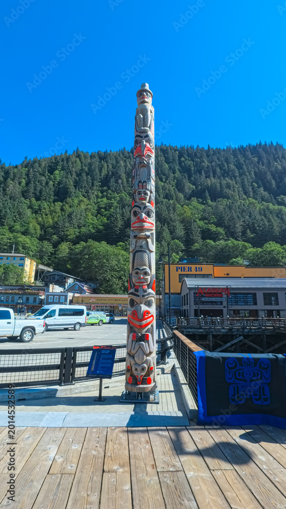 Fototapeta premium Juneau, Alaska - USA - August 5, 2024 - Totem pole on Seawalk