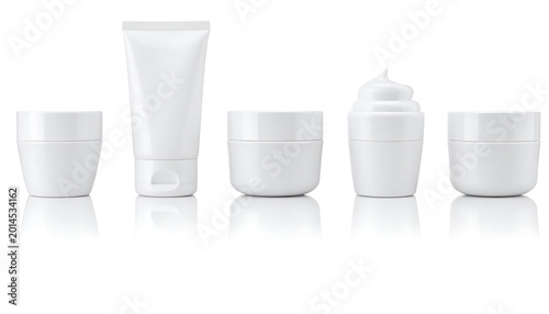 Set of clean white cosmetic containers including jars and a tube, ideal for skincare product branding and packaging design.