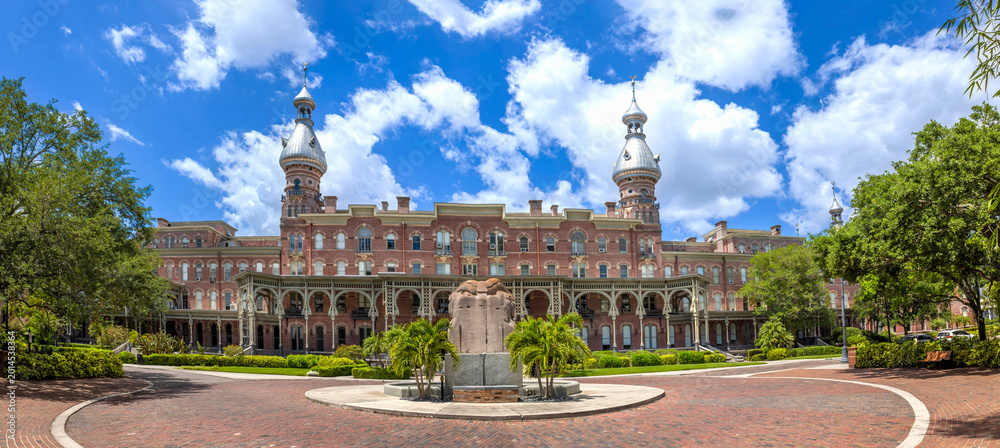 Fototapeta premium A wide panoramic view of the historic University of Tampa in Florida featuring distinctive Moorish architecture with silver minarets and brick facade
