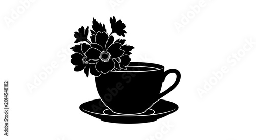Black teacup silhouette with blooming flowers inside saucer set