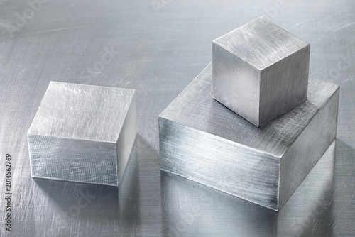 Close-up of Pure Iron Blocks and Industrial Iron Square Profiles