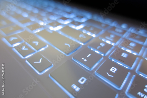 Backlit keyboard glowing in the dark, Backlit keyboard concept