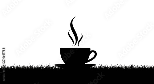 Cuadro en lienzo Black silhouette of steaming coffee cup on saucer amidst grassy ground