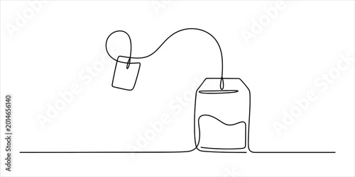 Fotografija Continuous one line drawing of a tea bag with a small paper tag for steeping hot