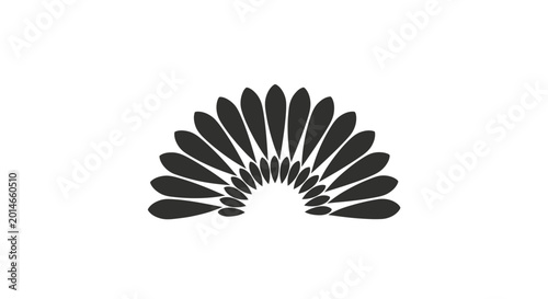 Bild auf Leinwand A stylized, dark gray, semicircular fan-shaped design composed of many overlappi