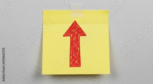 red arrow on a yellow wall