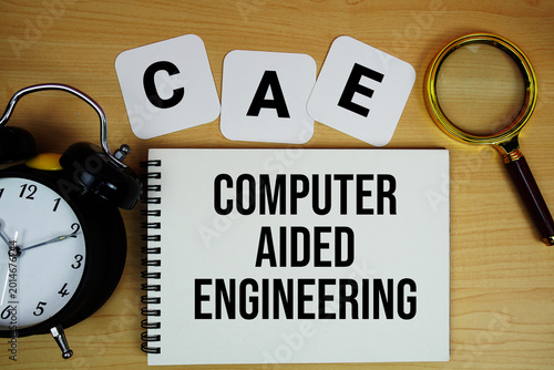 Tableau sur toile CAE Computer Aided Engineering text written on notepad with magnifying glass and