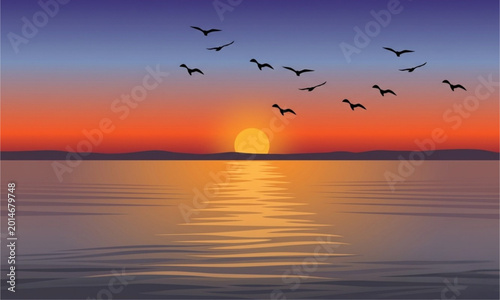 Serene Ocean Sunset with Silhouetted Birds Flying over Water