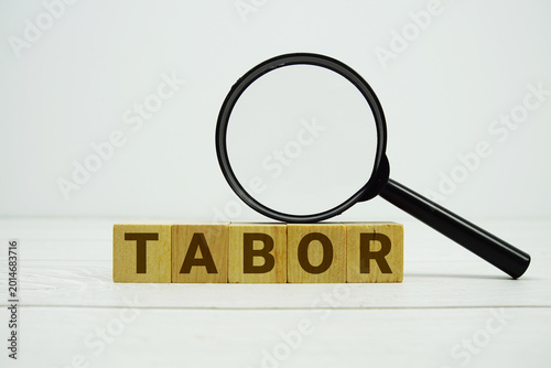 Tableau sur toile TABOR (Taxpayer Bill of Rights) alphabet letters with magnifying glass on wooden