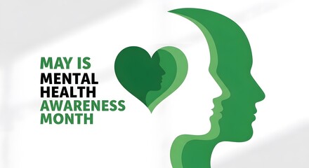 Green heart and human head silhouette with mental health awareness month text on white