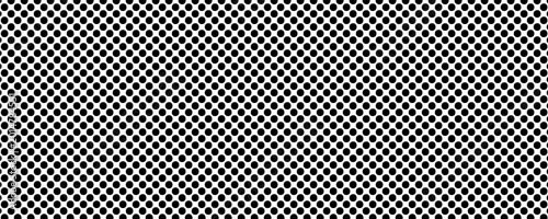 Black circular dots on white background. Mosaic holey print. Perforated metal texture. Peg board, radiator or speaker grill surface with repeated round holes. Vector graphic illustration.Eps10