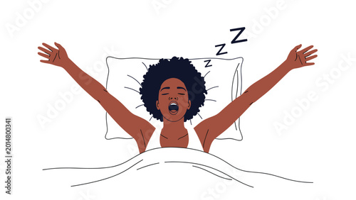 Young African American woman yawning and stretching her arms in bed as she wakes up from a restful sleep in the morning.