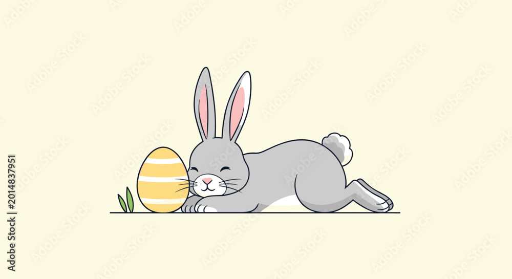 Fototapeta premium Gentle gray bunny rabbit sleeping peacefully next to a yellow striped Easter egg on a pale yellow background.