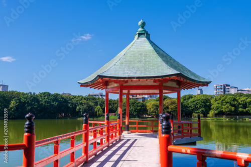 Iconic hexagonal red pavilion at Ohori lake park, Fukuoka, Japan