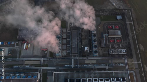 Aerial view of data center cooling system emitting steam
