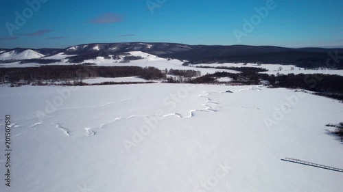 Flight over a snow-covered river
