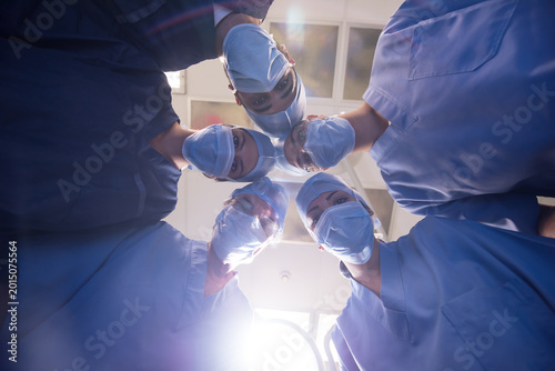 Photos Modern Middle Eastern eye hospital surgical team preparing for operation in smal