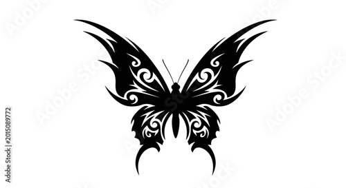 Foto Butterfly displays elaborate tribal markings across its symmetrical wings in a striking black and white graphic composition