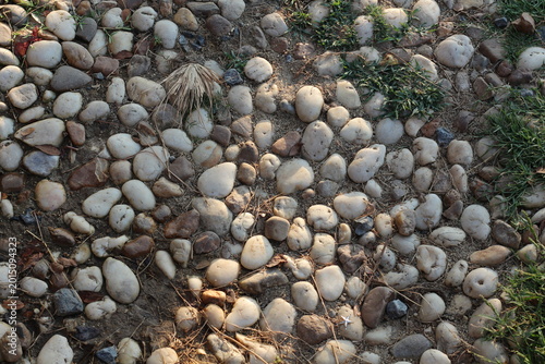 Canvas Print Smooth, rounded river stones and pebbles create a textured natural ground cover