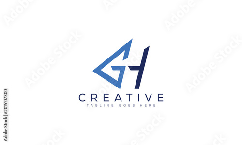 Gh letters forming an angular arrow-like shape logo in blue and dark blue colors Free Download Gh letters forming an angular arrow-like shape logo in blue and dark blue colors - GFXLoad