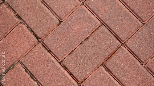 The texture of pattern of red paving blocks, top view