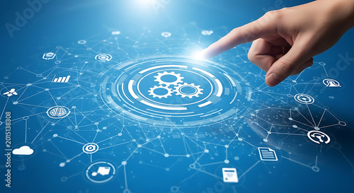 Hand pointing to interconnected digital network of gears and data points, representing automation and technology