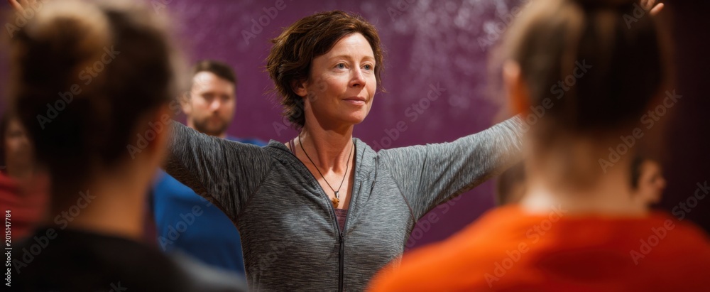 Fototapeta premium The yoga instructor is like a compass steering minds through a blissful session.