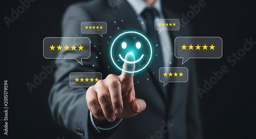 Businessman interacting with glowing smiley face and rating stars