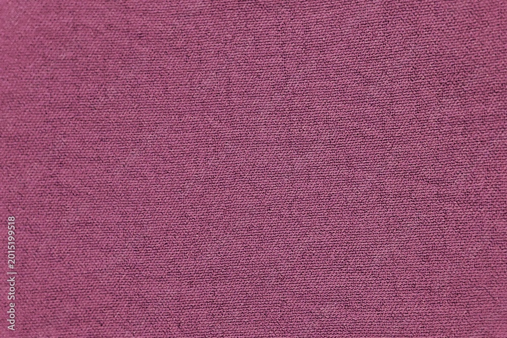 Fototapeta premium Magenta purple knitted fabric texture background macro close up