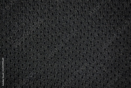 Black breathable mesh fabric texture background macro perforated textile
