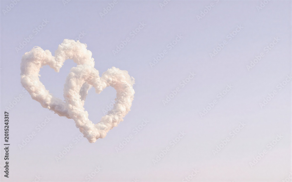 Fototapeta premium Two heart-shaped clouds float gently against a soft dreamy sky.