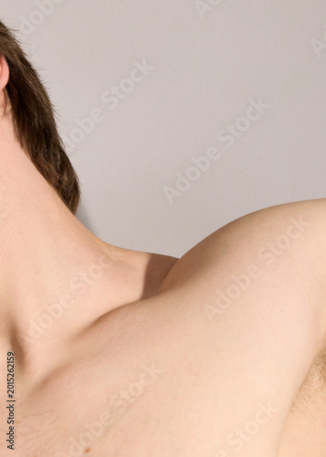 A man shows off his muscles, a real photo of people