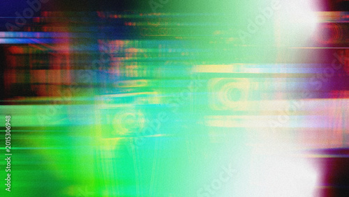 Abstract colorful blurred background with vibrant green, blue, and red hues creating a dynamic visual effect suitable for artistic or design applications