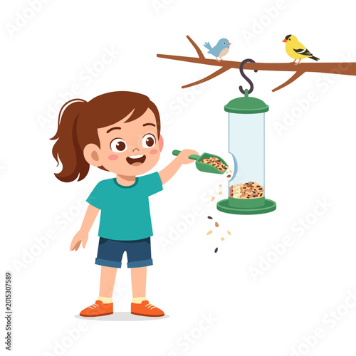 Young girl filling bird feeder with seeds and enjoying nature  