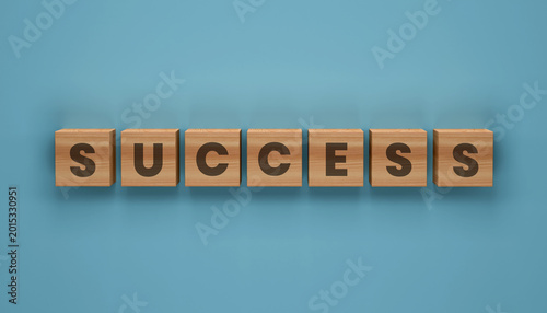 Tableau sur toile Success Blocks: A top-down perspective on wooden blocks spelling Success, artfully arranged on a calm blue surface, conveying a message of achievement and potential