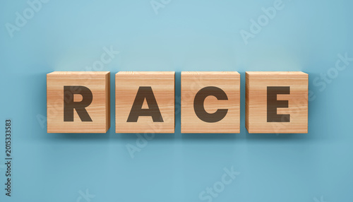 Photos Wooden Blocks Spell Out Race: A simple yet impactful visual, RACE spelled out in wooden blocks, poised against a clean backdrop, sparks contemplation