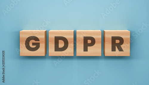 Bild auf Leinwand GDPR Concept: A close-up shot of wooden blocks spelling out GDPR (General Data Protection Regulation) on a blue backdrop, the image underscores the significance of data privacy and compliance