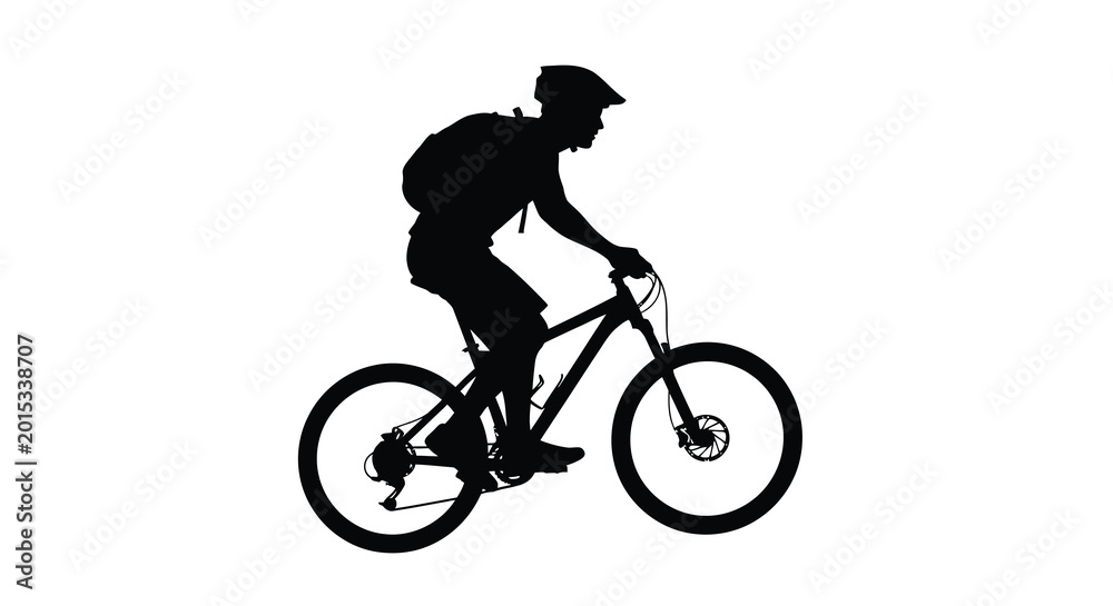 Obraz premium Silhouette of a cyclist riding a mountain bike with a backpack