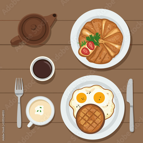 Overhead view of a delicious breakfast spread featuring French toast, fried eggs, and a waffle on a rustic wooden table with beverages.