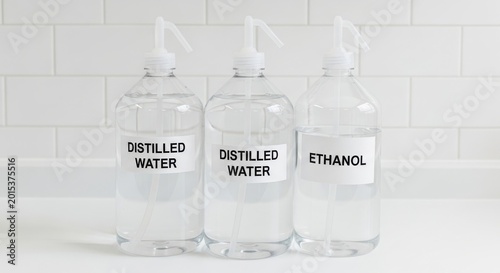 Bottles of Distilled Water and Ethanol for Cleaning