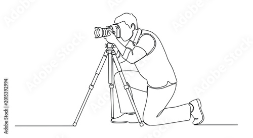 Photographer kneeling with camera on tripod capturing images line art
