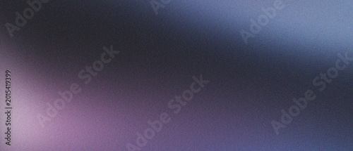 Purple and blue atmospheric gradient background with film grain texture providing elegant soft lighting effect for creative digital media applications.