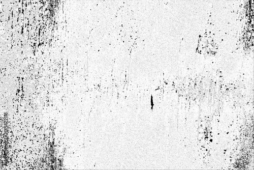 Schilderij op canvas Distressed textured surface with numerous black speckles and vertical scratch marks on a white background