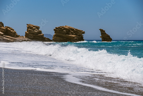 Vászonkép Landscape with waves crashing against characteristic rocks on Triopetra Beach on