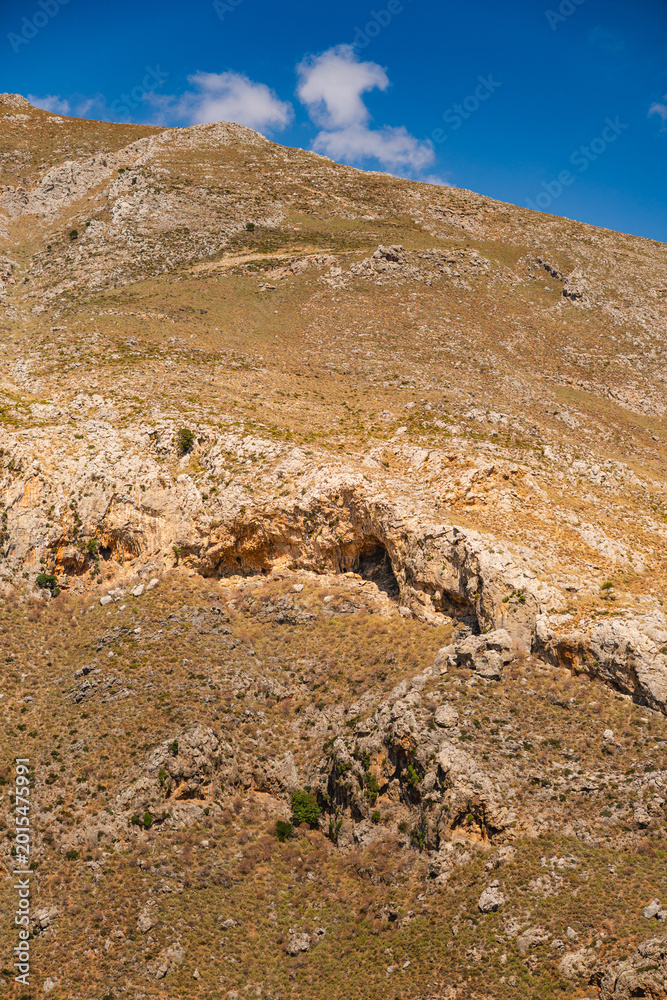 Fototapeta premium The landscape of sharp mountain peaks in Kourtaliotiko Gorge on the Greek island of Crete