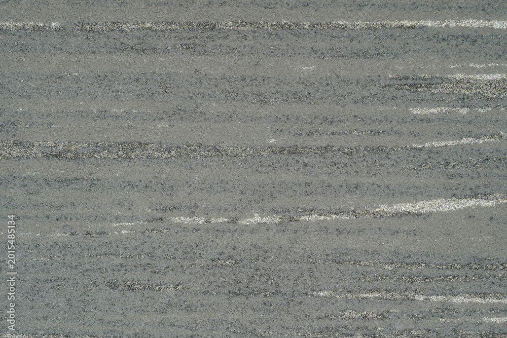 Fototapeta premium Close-up of textured wallpaper surface with subtle grain pattern. Minimal interior wall covering with soft neutral tones and detailed material texture