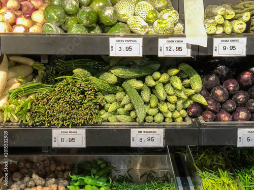 Photos Vegetables on supermarket shelve