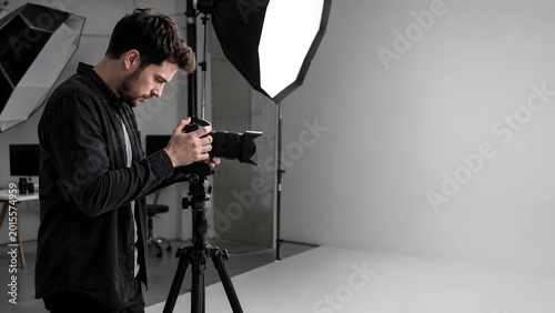 Photographer at work in studio