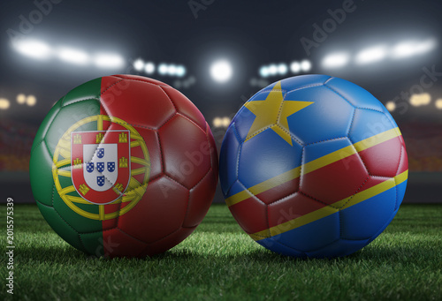 Canvastavla Two soccer balls in flags colors on a stadium blurred background