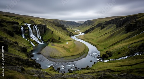 Green Valley River Waterfall Landscape Under Dramatic Cloudy Sky